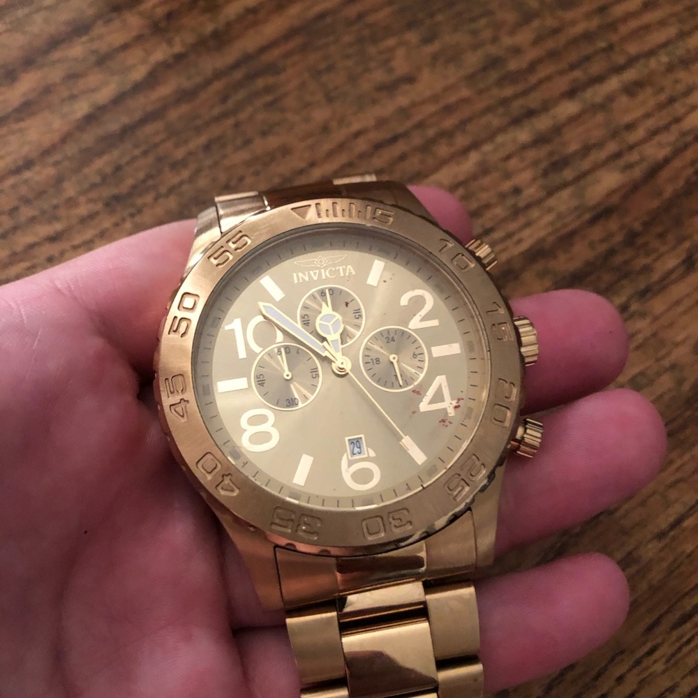 Gold invicta watch